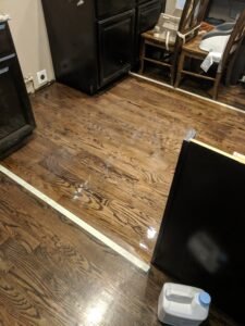 Hardwood floor restoration and refinishing process