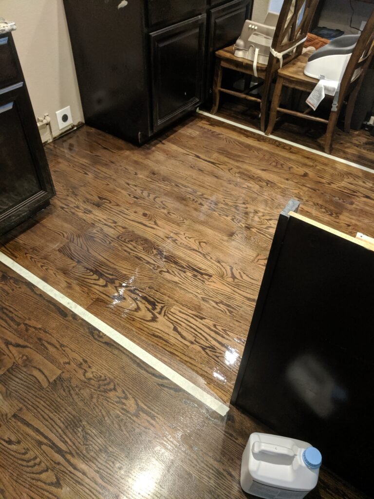 Hardwood floor restoration and refinishing process